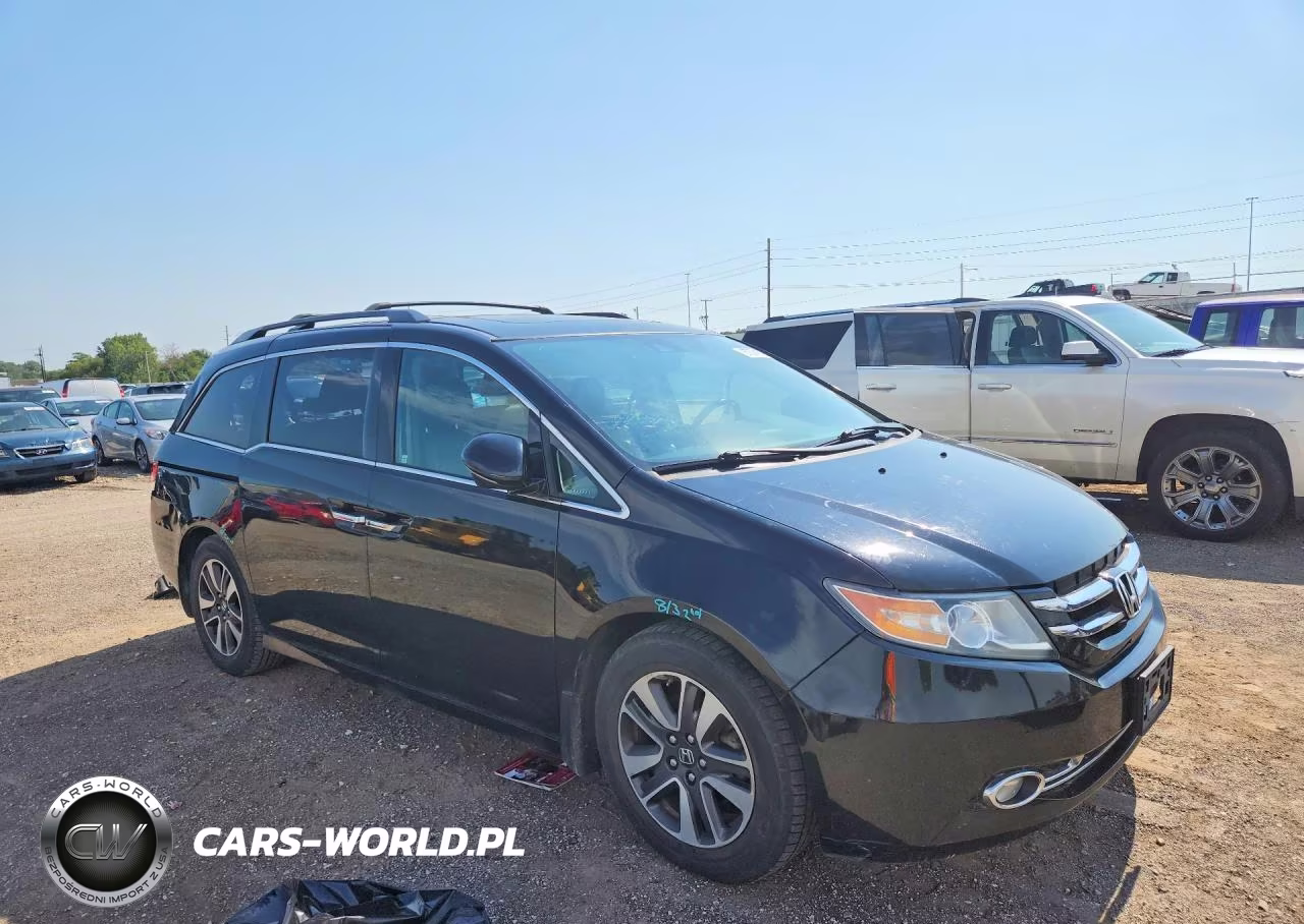 2015 Honda Odyssey Touring VIN:5FNRL5H96FB120751 - 4