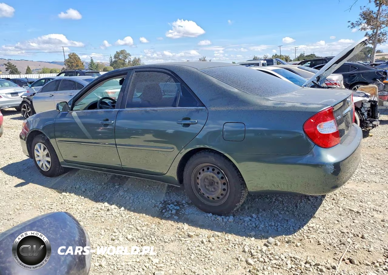 2002 Toyota Camry Le VIN:JTDBE32K820076692 - 2