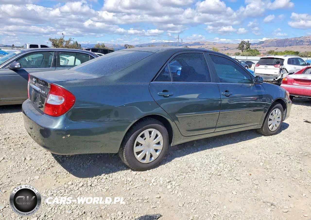 2002 Toyota Camry Le VIN:JTDBE32K820076692 - 3