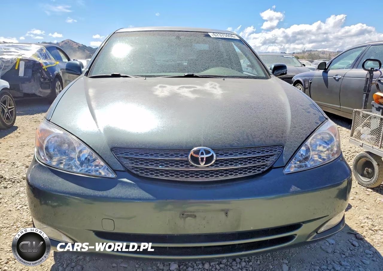 2002 Toyota Camry Le VIN:JTDBE32K820076692 - 5