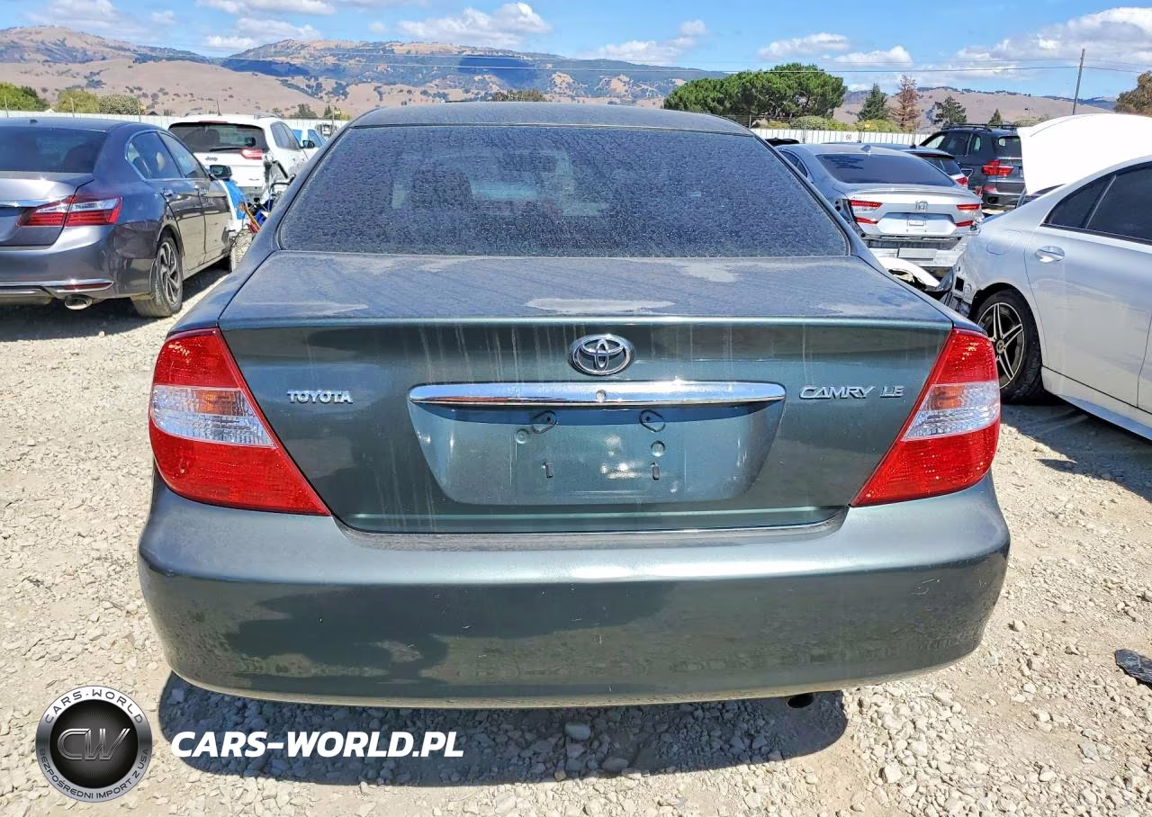 2002 Toyota Camry Le VIN:JTDBE32K820076692 - 6