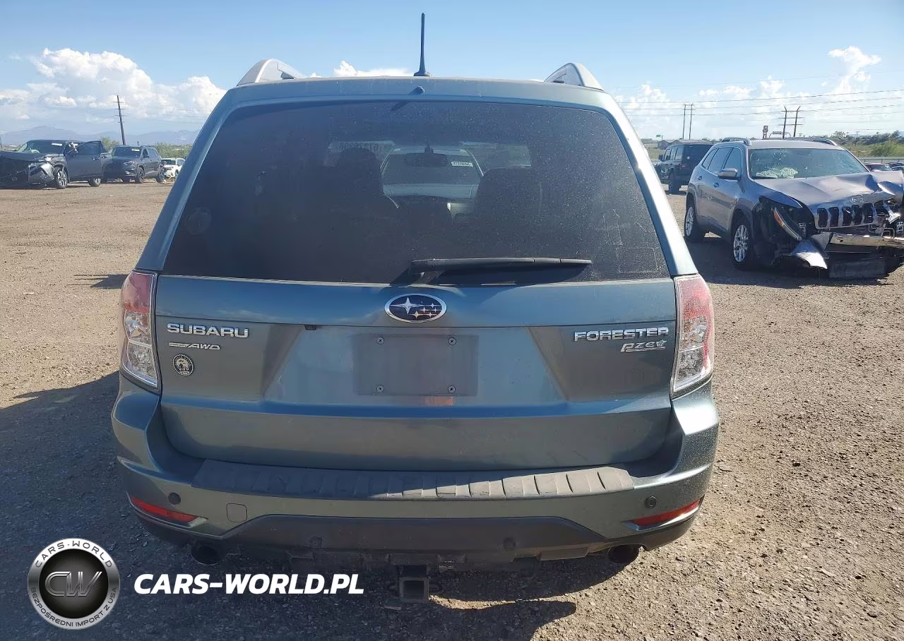 2011 Subaru Forester Touring VIN:JF2SHAHC1BH712402 - 6