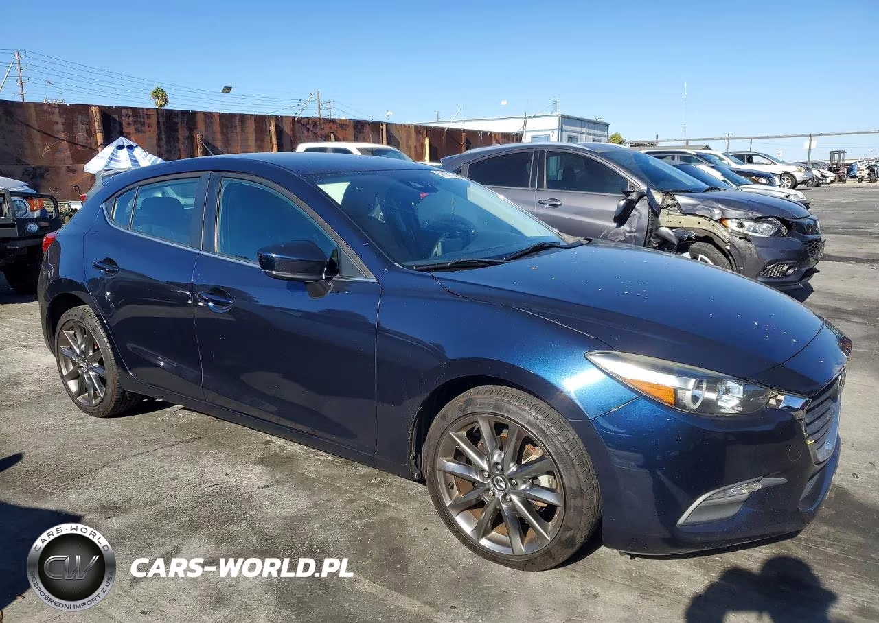 2018 Mazda 3 Touring VIN:3MZBN1L36JM270416 - 4