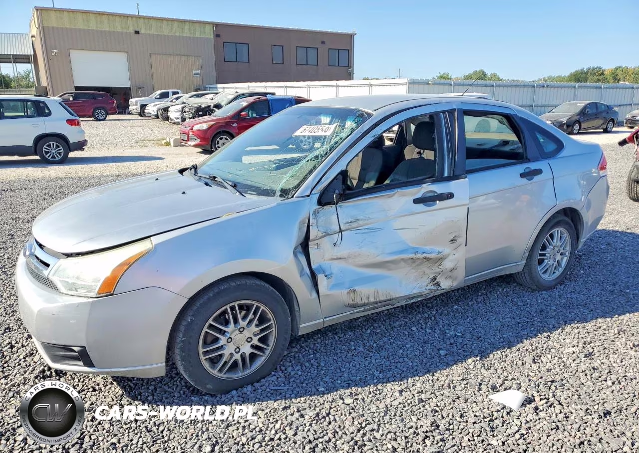 2009 Ford Focus Se VIN:1FAHP35N19W101360 - 1