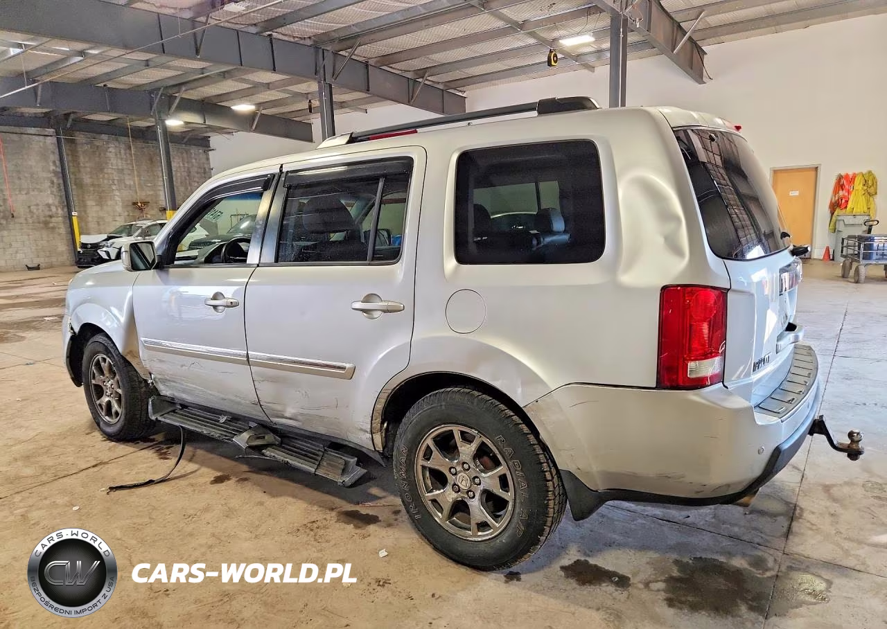 2011 Honda Pilot Touring VIN:5FNYF4H95BB071081 - 2