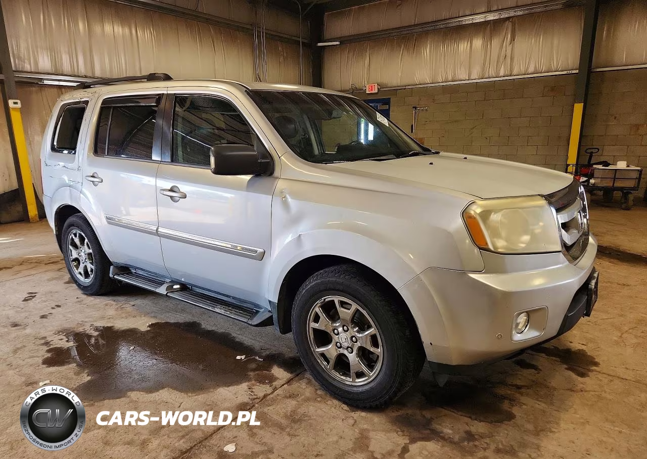 2011 Honda Pilot Touring VIN:5FNYF4H95BB071081 - 4