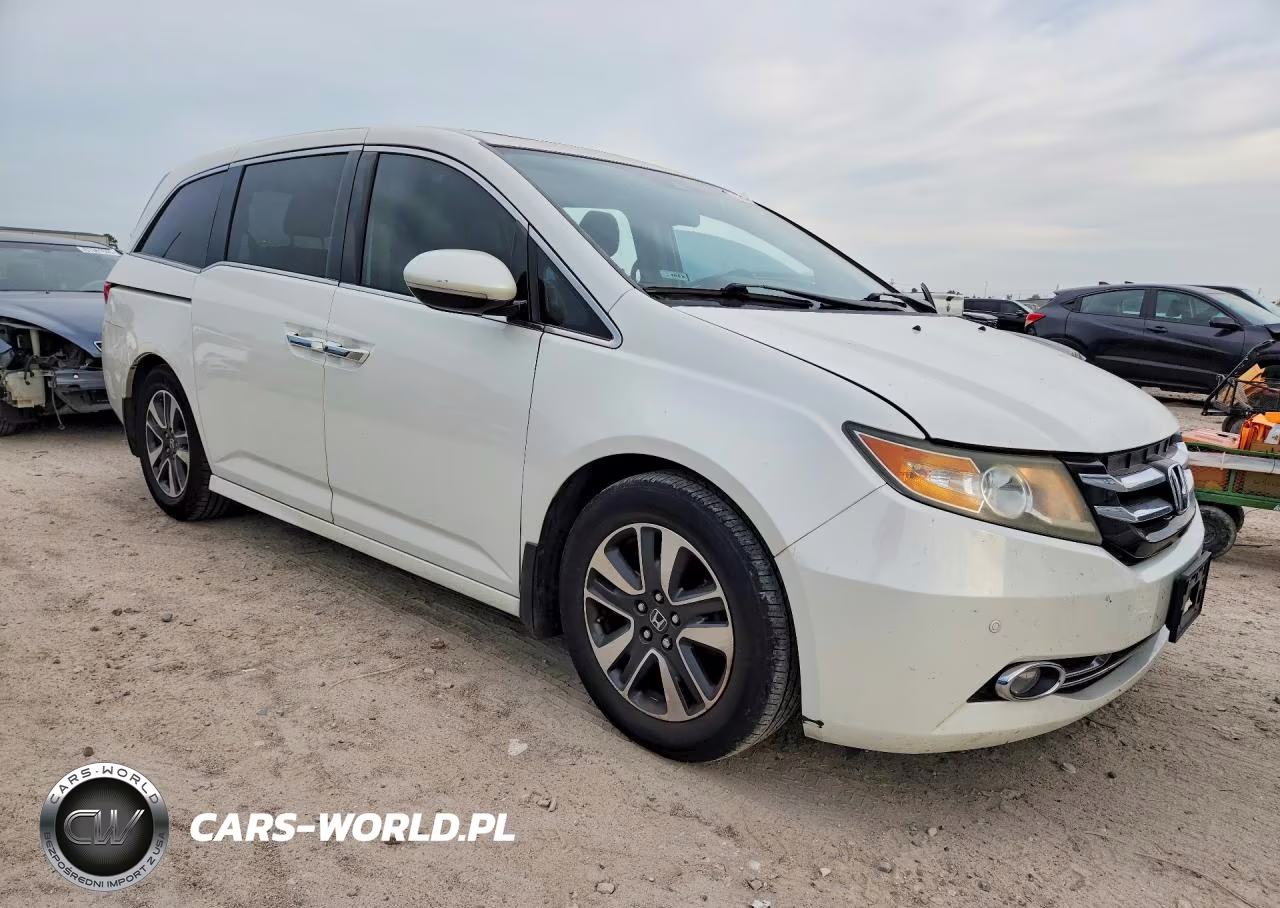 2014 Honda Odyssey Touring VIN:5FNRL5H97EB050367 - 4