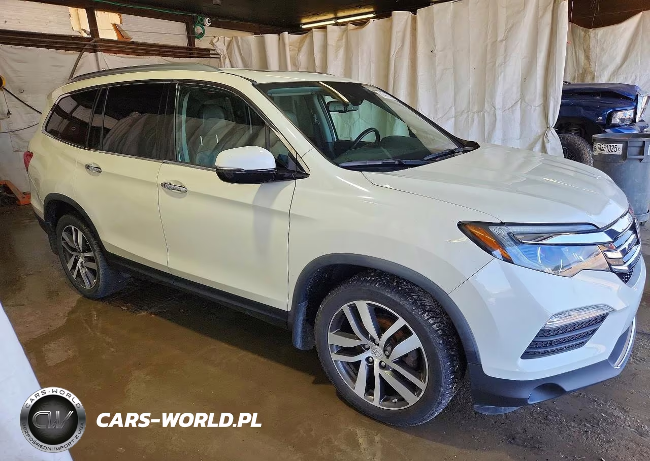 2016 Honda Pilot Elite VIN:5FNYF6H05GB113768 - 4