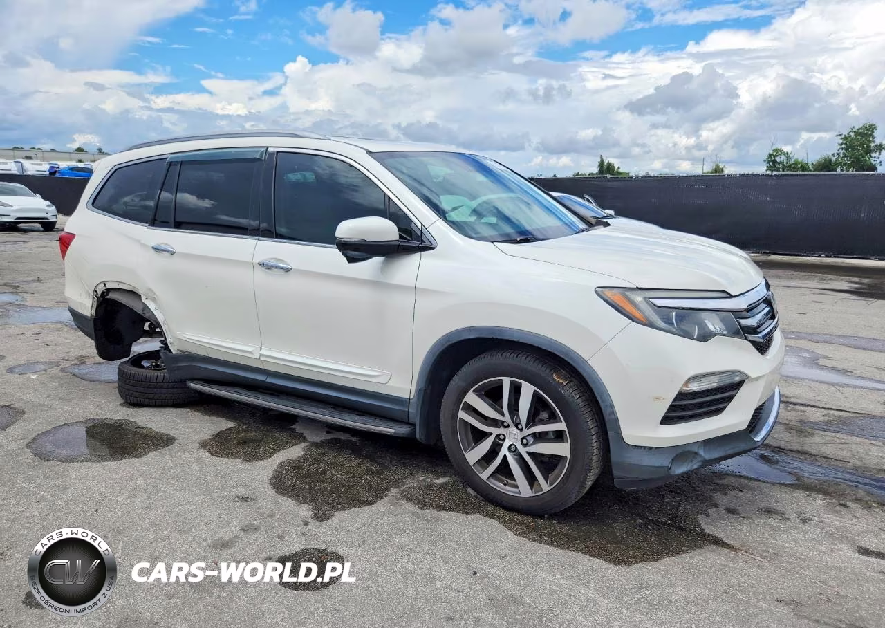 2018 Honda Pilot Touring VIN:5FNYF6H97JB019915 - 4