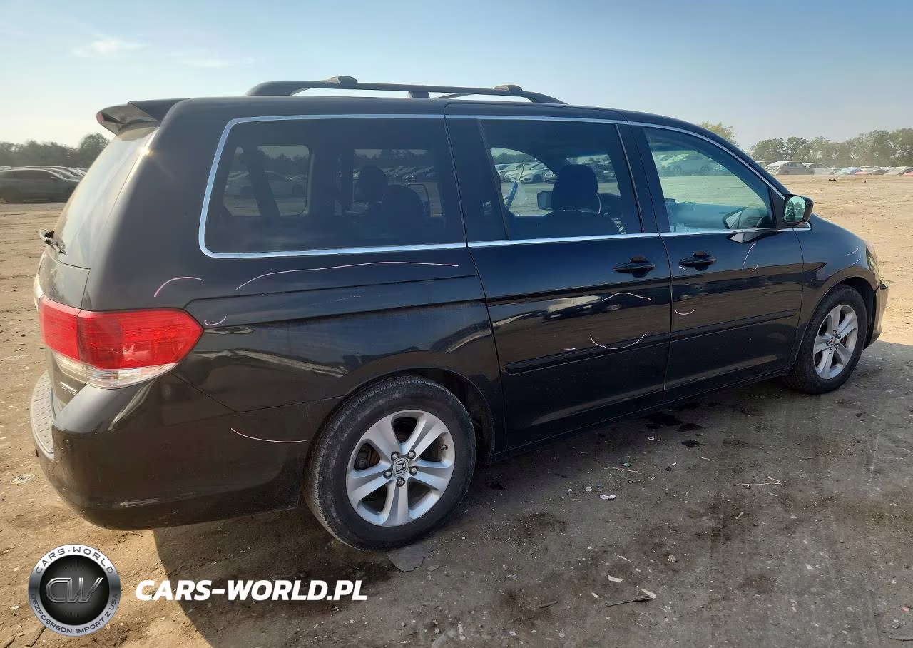 2010 Honda Odyssey Touring VIN:5FNRL3H94AB091120 - 3