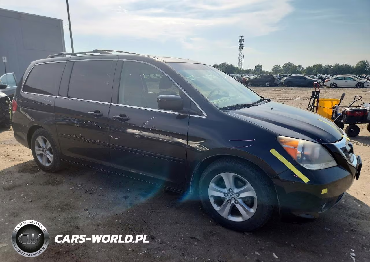2010 Honda Odyssey Touring VIN:5FNRL3H94AB091120 - 4