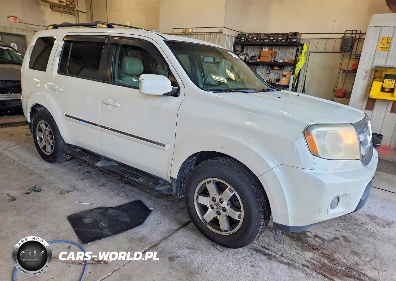 2011 Honda Pilot Touring VIN:5FNYF4H92BB049121 - 4
