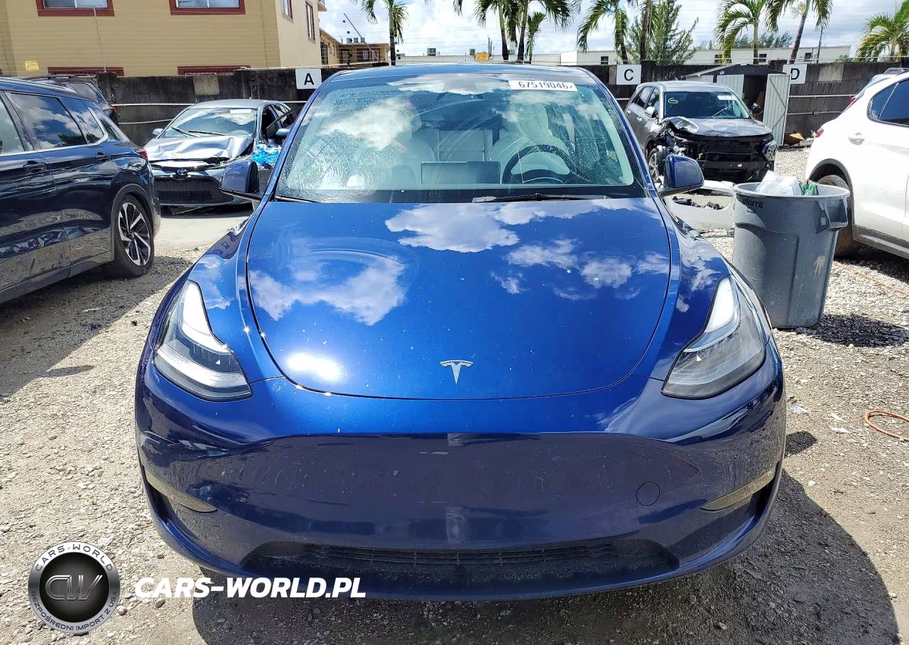 2023 Tesla Model Y VIN:7SAYGAEE8PF801427 - 5