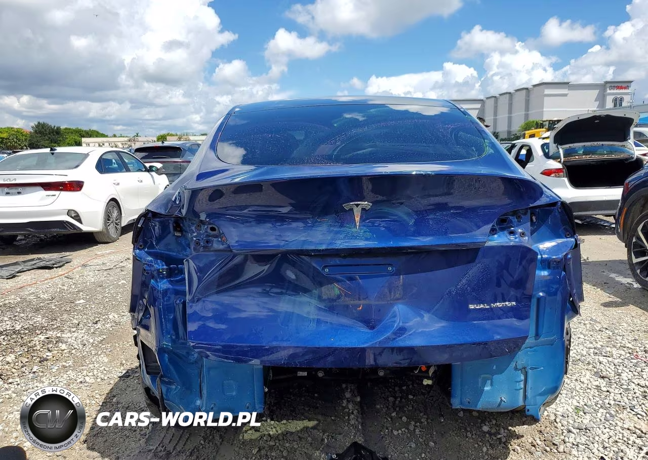 2023 Tesla Model Y VIN:7SAYGAEE8PF801427 - 6