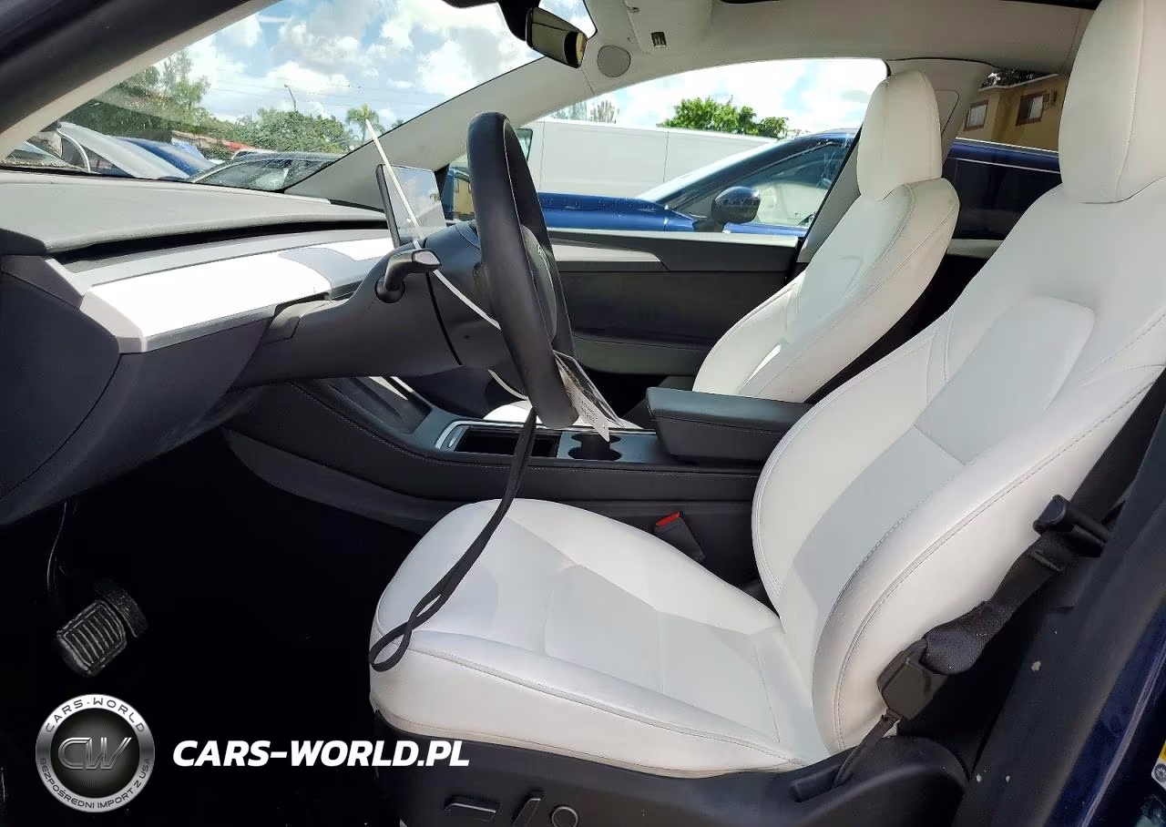 2023 Tesla Model Y VIN:7SAYGAEE8PF801427 - 7