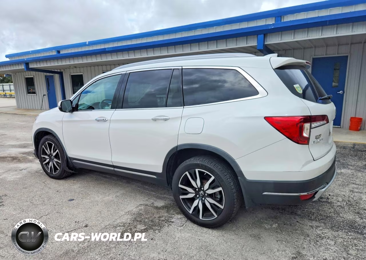 2022 Honda Pilot Touring VIN:5FNYF6H61NB045566 - 2