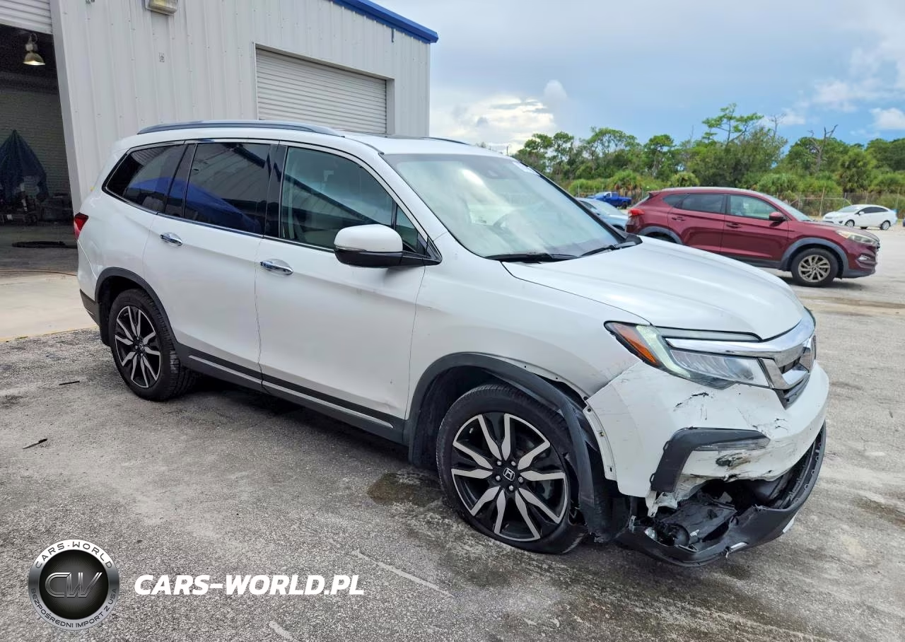 2022 Honda Pilot Touring VIN:5FNYF6H61NB045566 - 4