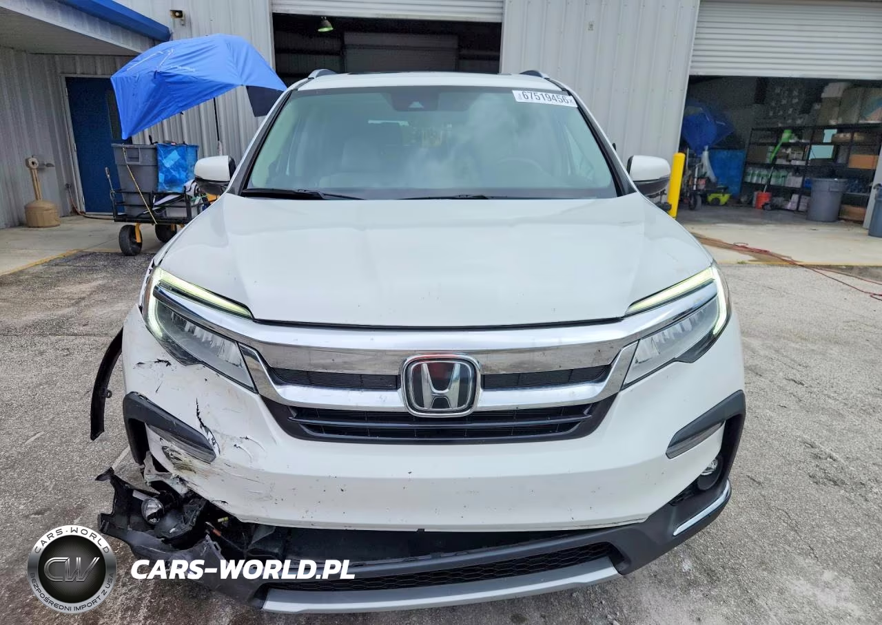 2022 Honda Pilot Touring VIN:5FNYF6H61NB045566 - 5