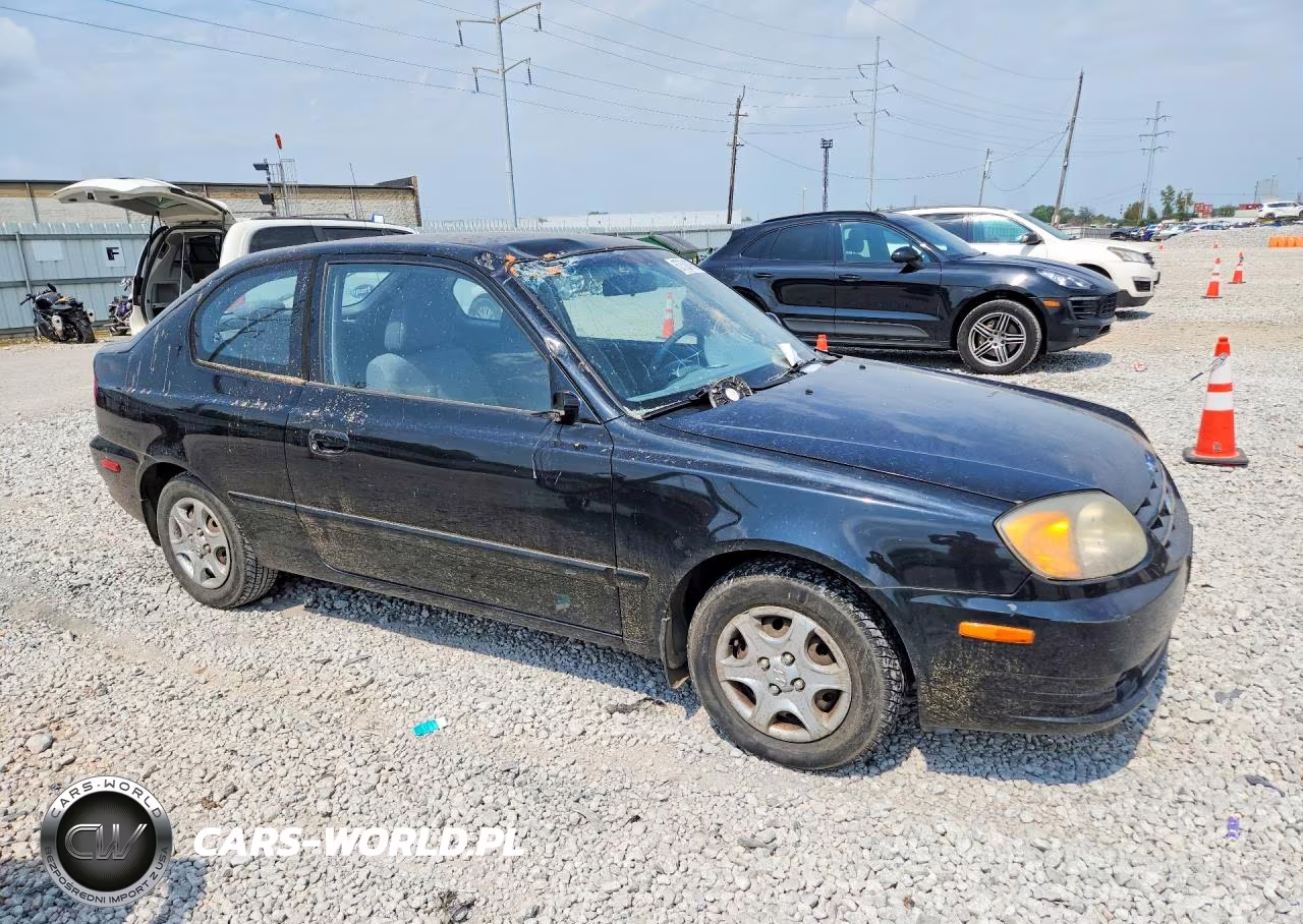 2005 Hyundai Accent Gls VIN:KMHCG35CX5U323559 - 4