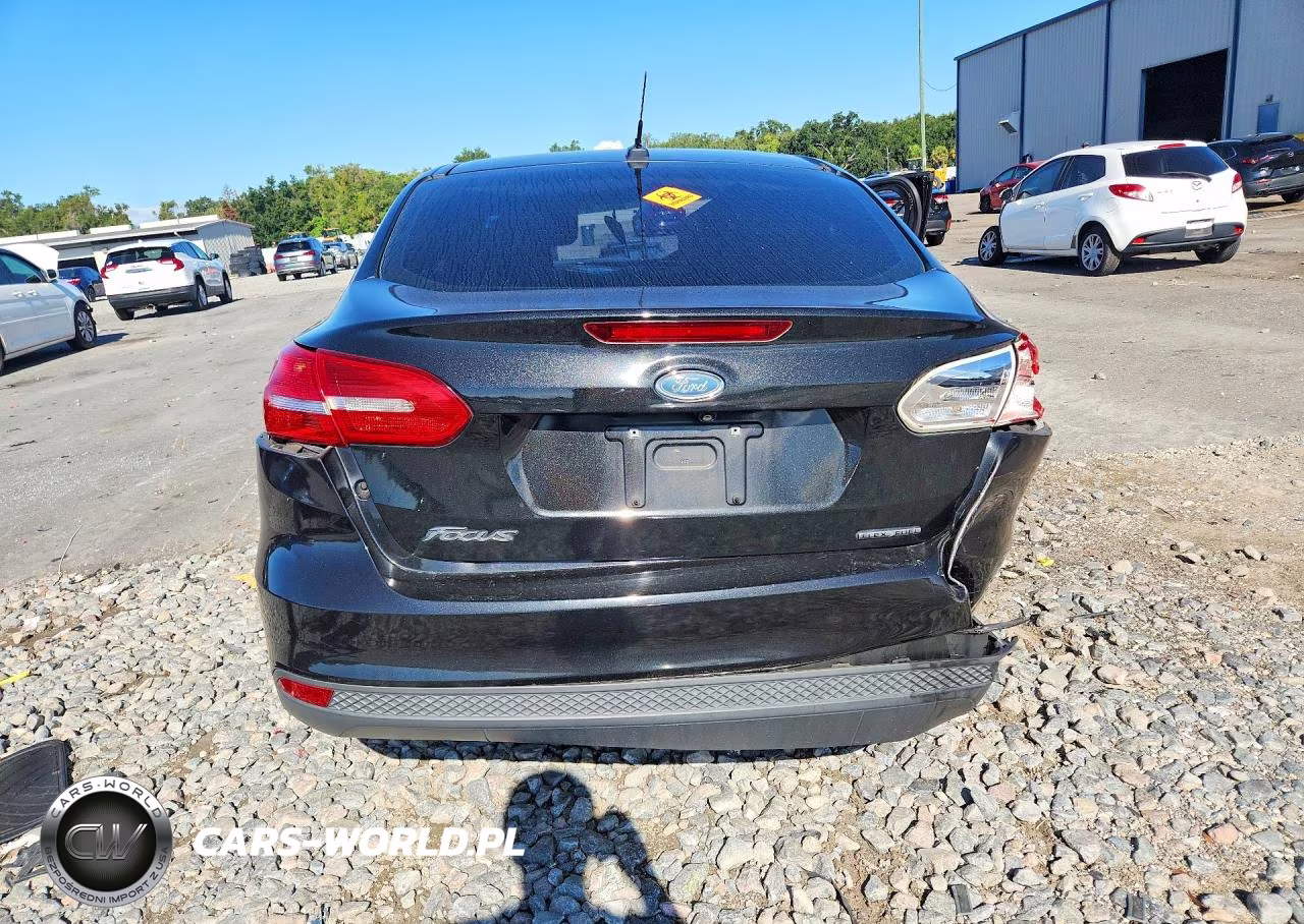 2015 Ford Focus S VIN:1FADP3E25FL354537 - 6