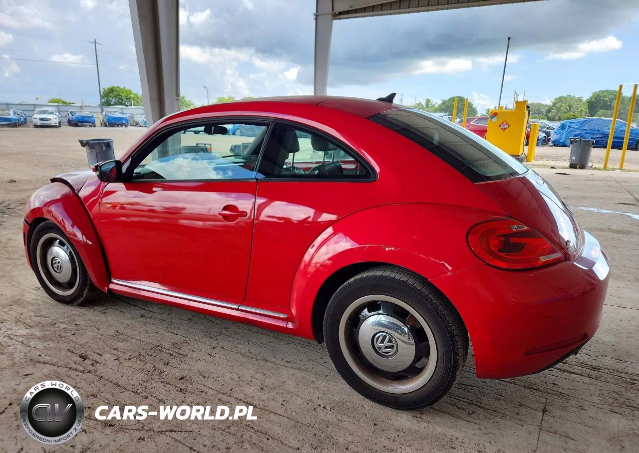2014 Volkswagen Beetle VIN:3VWJX7ATXEM606912 - 2