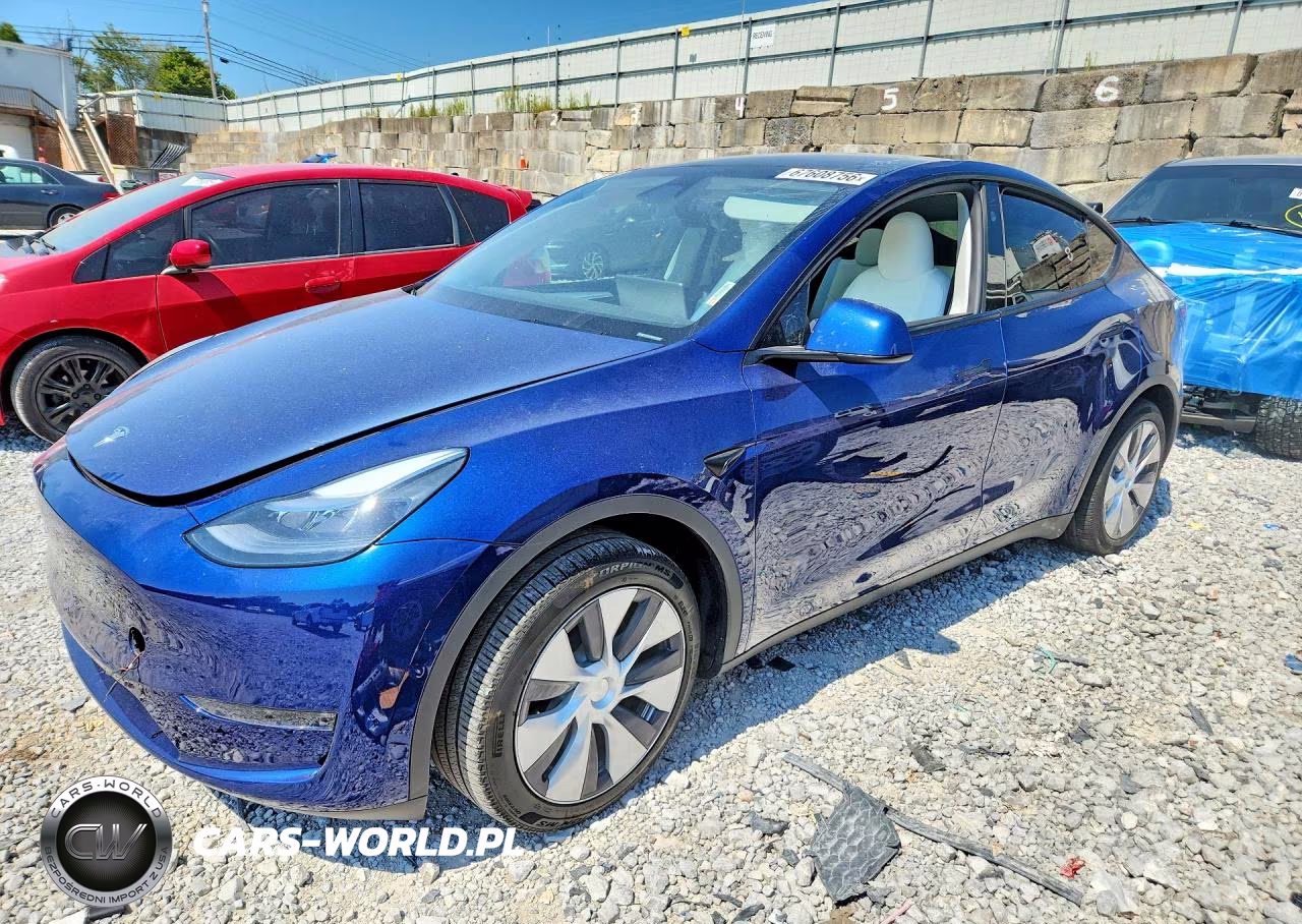 2024 Tesla Model Y VIN:7SAYGDEE5RA278417 - 1