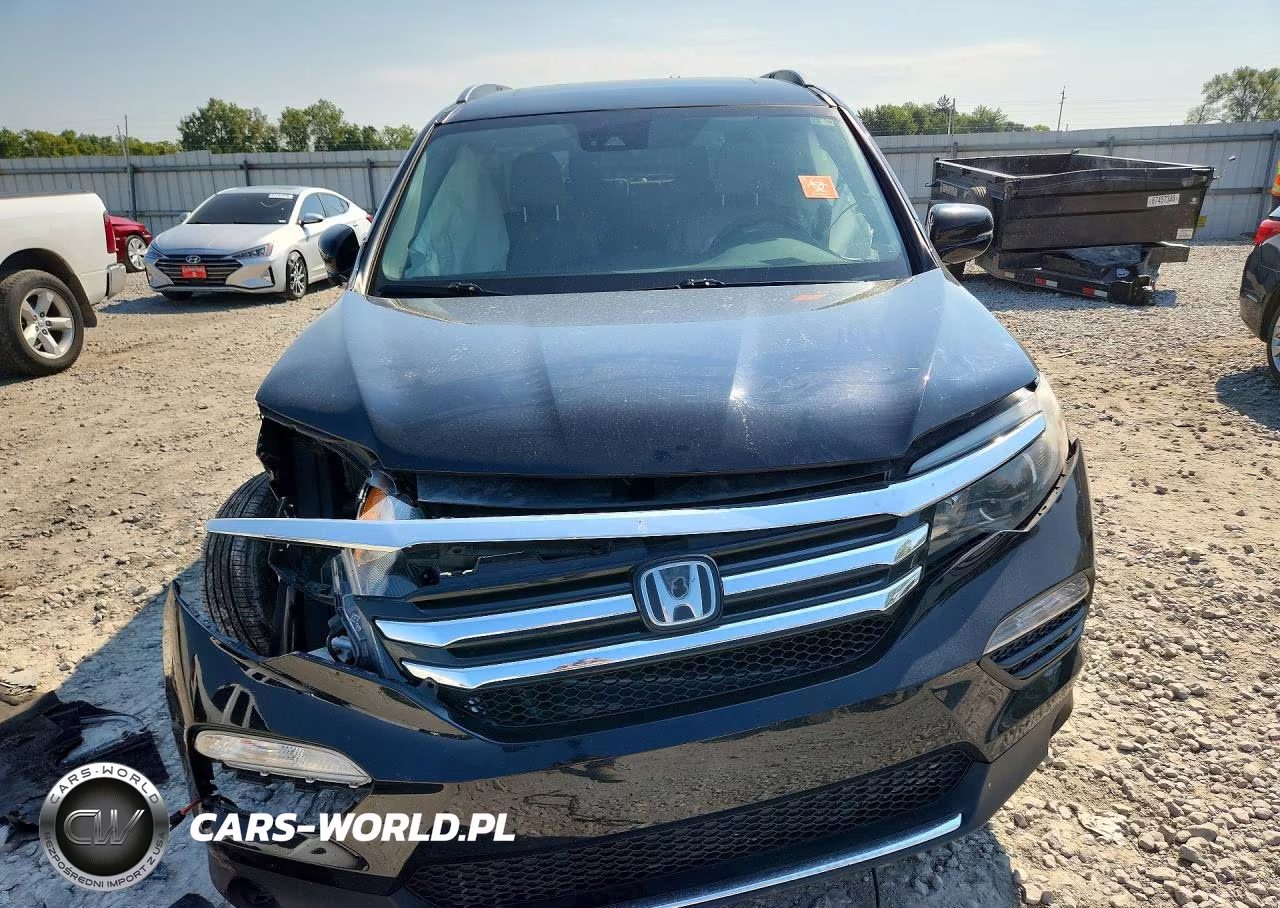 2018 Honda Pilot Elite VIN:5FNYF6H07JB060739 - 5