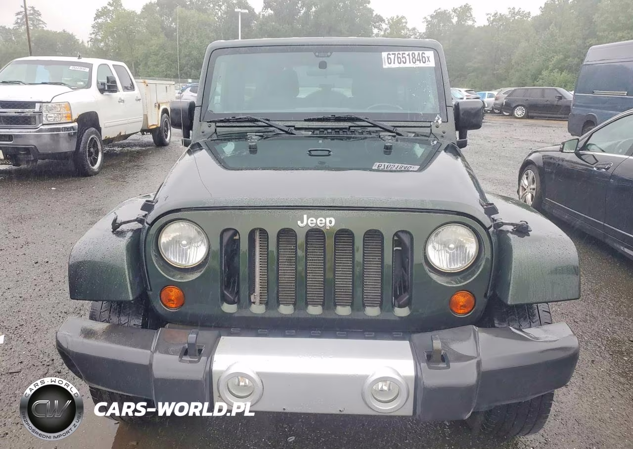 2011 Jeep Wrangler Unlimited Sahara VIN:1J4BA5H18BL633972 - 5