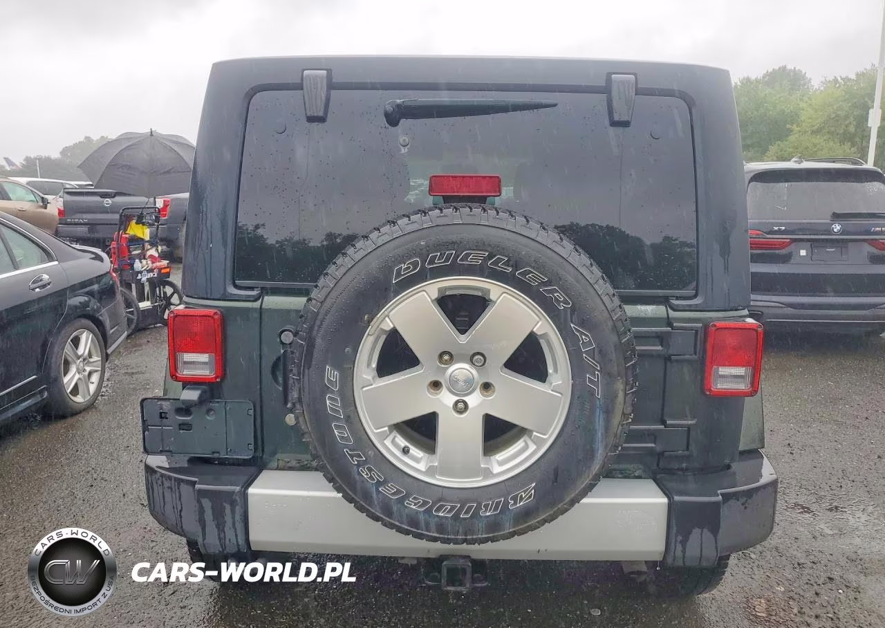 2011 Jeep Wrangler Unlimited Sahara VIN:1J4BA5H18BL633972 - 6