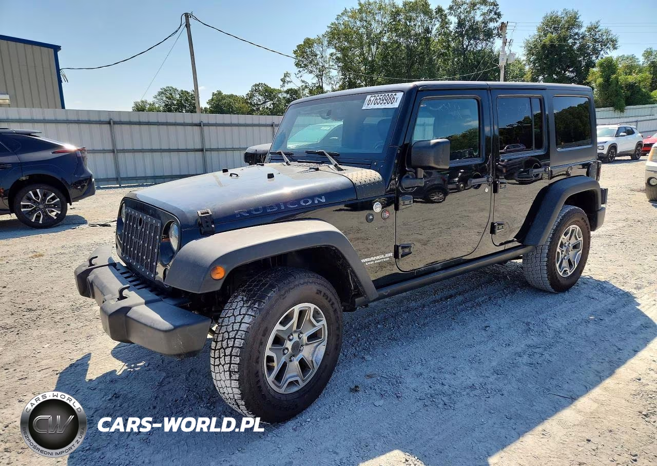 2015 Jeep Wrangler Unlimited Rubicon VIN:1C4HJWFG8FL704784 - 1