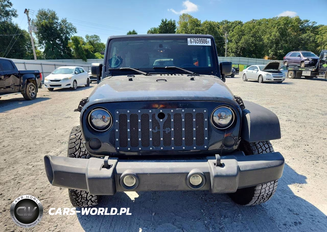 2015 Jeep Wrangler Unlimited Rubicon VIN:1C4HJWFG8FL704784 - 5