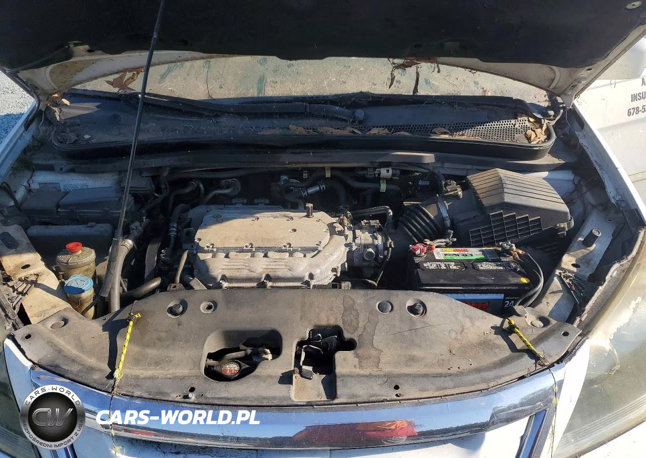 2010 Honda Odyssey Touring VIN:5FNRL3H90AB097478 - 12