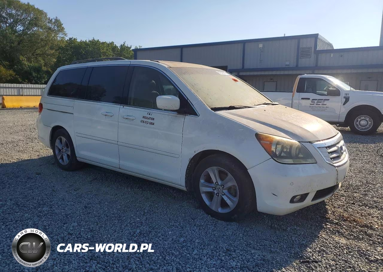 2010 Honda Odyssey Touring VIN:5FNRL3H90AB097478 - 4