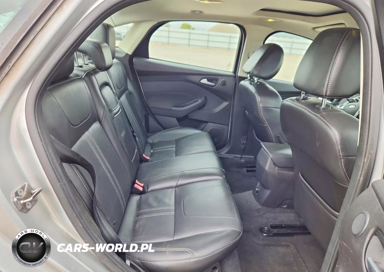2013 Ford Focus Titanium VIN:1FADP3J25DL249340 - 10