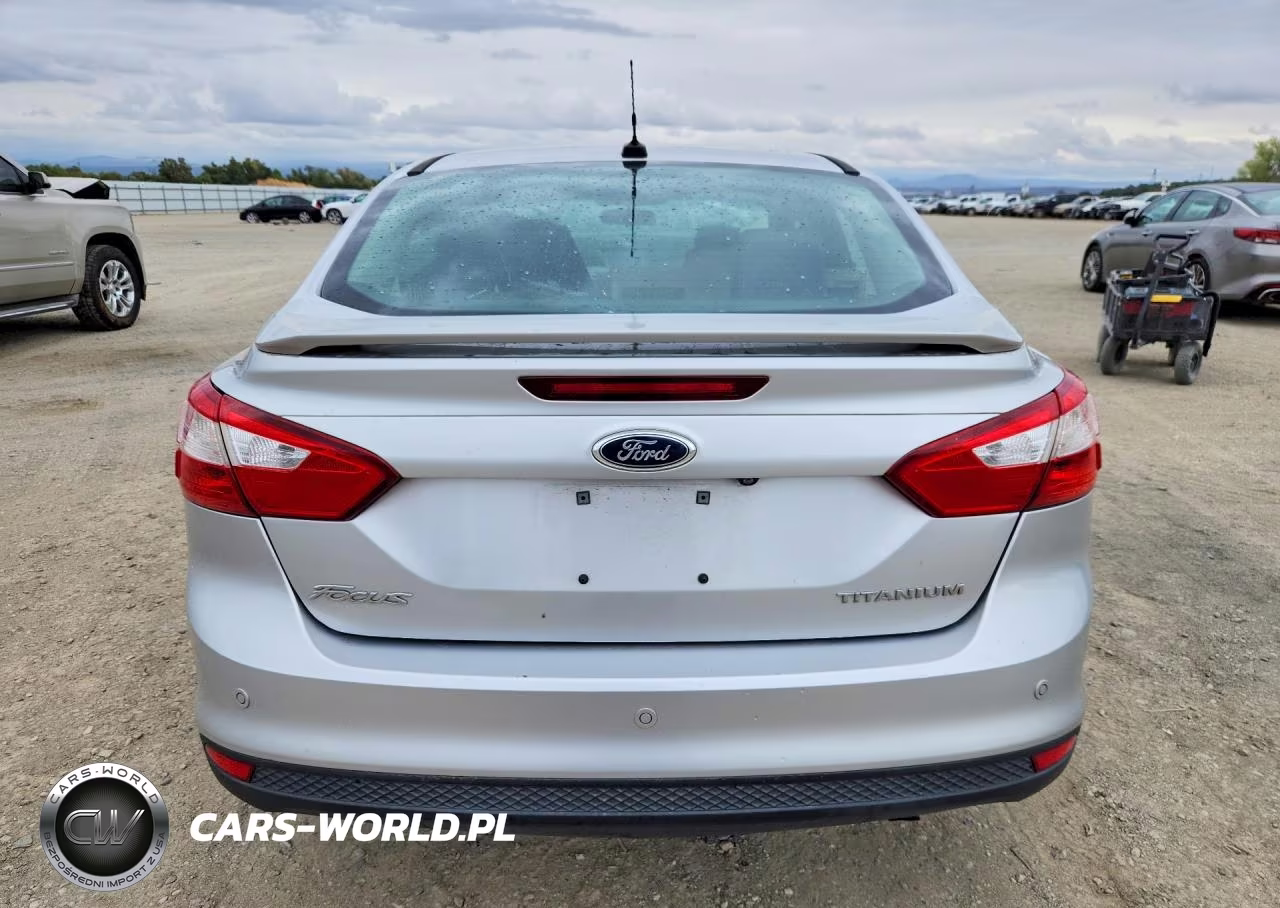 2013 Ford Focus Titanium VIN:1FADP3J25DL249340 - 6
