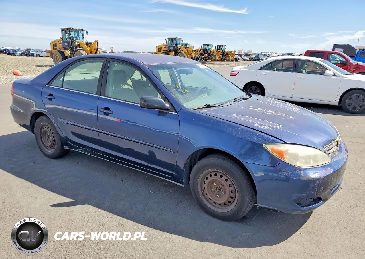 2002 Toyota Camry Le VIN:JTDBE32K020096063 - 4