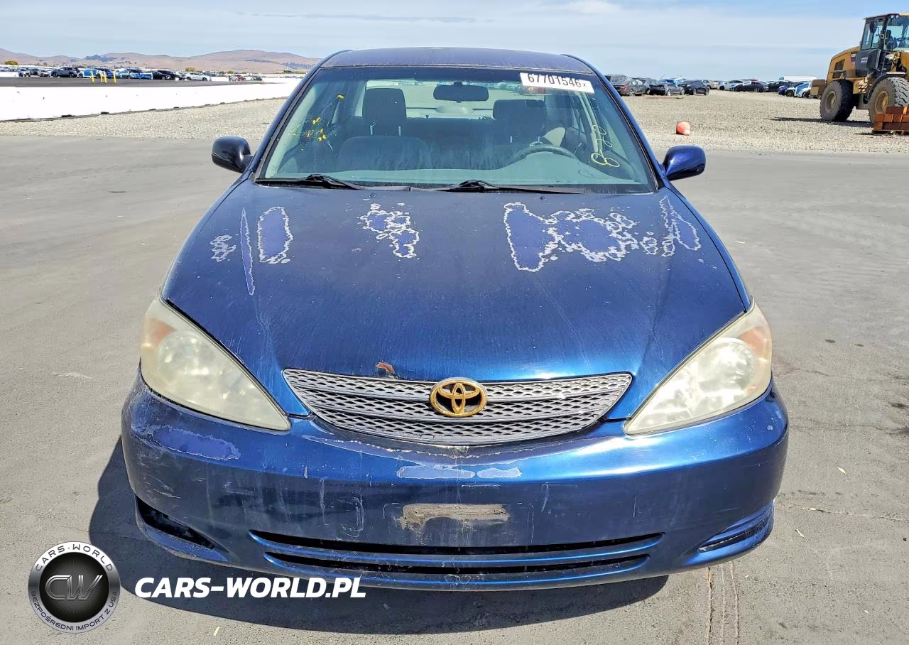 2002 Toyota Camry Le VIN:JTDBE32K020096063 - 5