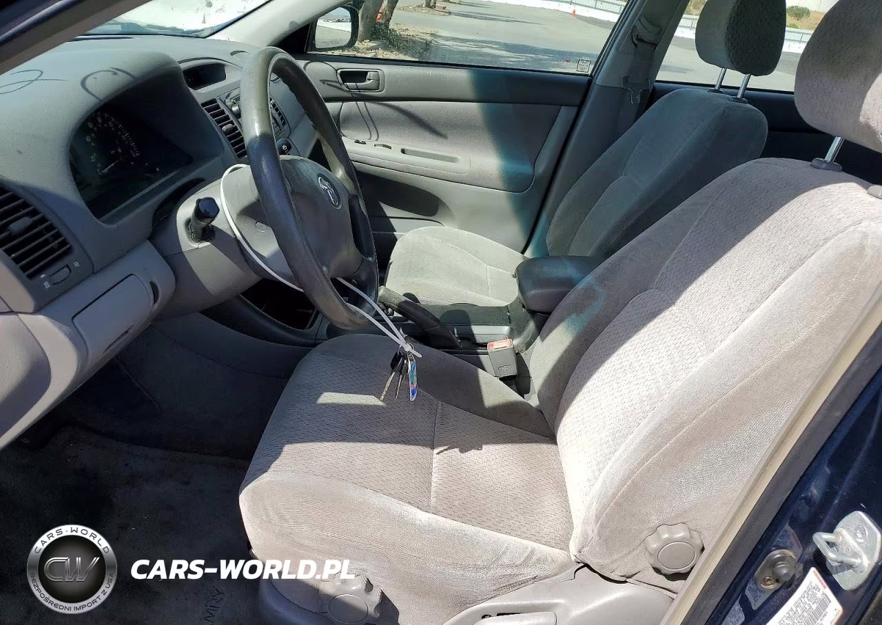 2002 Toyota Camry Le VIN:JTDBE32K020096063 - 7