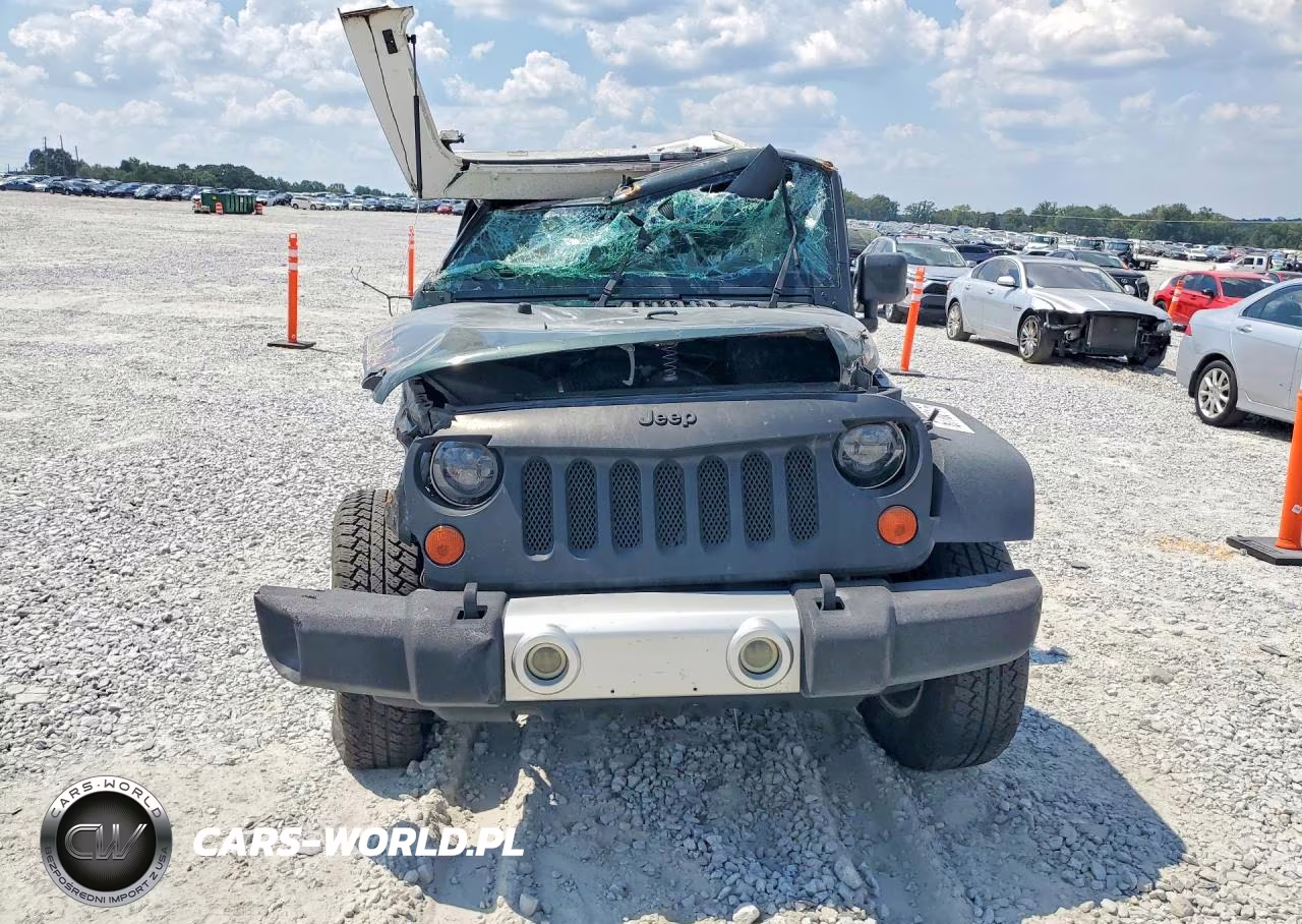 2011 Jeep Wrangler Unlimited Sahara VIN:1J4BA5H16BL632349 - 5