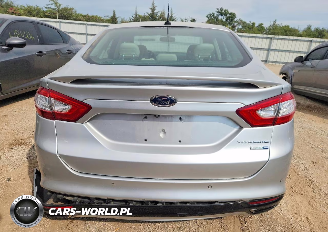 2016 Ford Fusion Titanium VIN:3FA6P0D9XGR211186 - 6