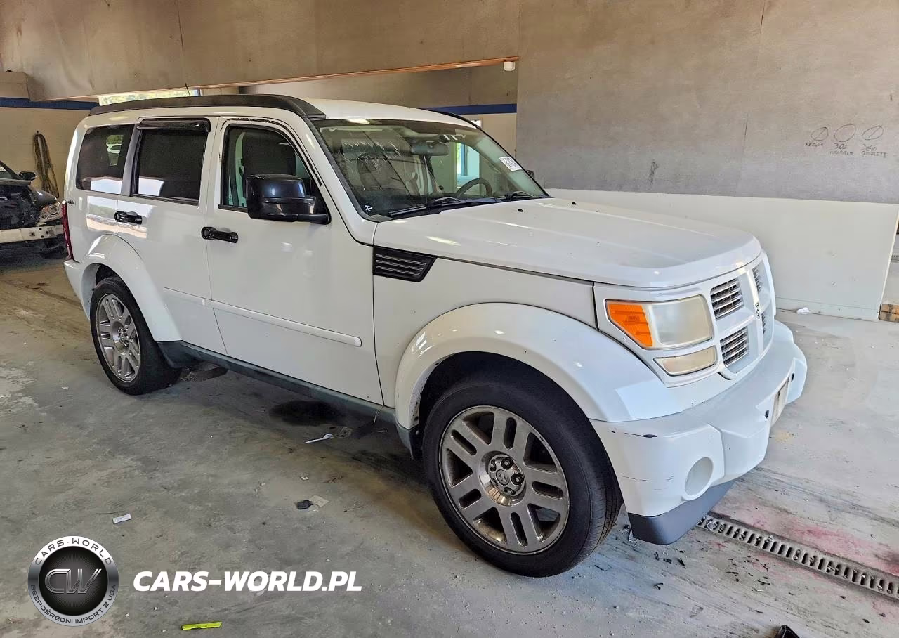 2011 Dodge Nitro Heat VIN:1D4PU4GK1BW598250 - 4