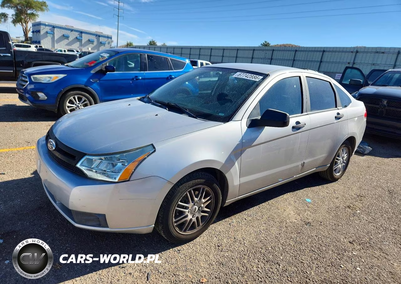 2009 Ford Focus Se VIN:1FAHP35N89W230664 - 1
