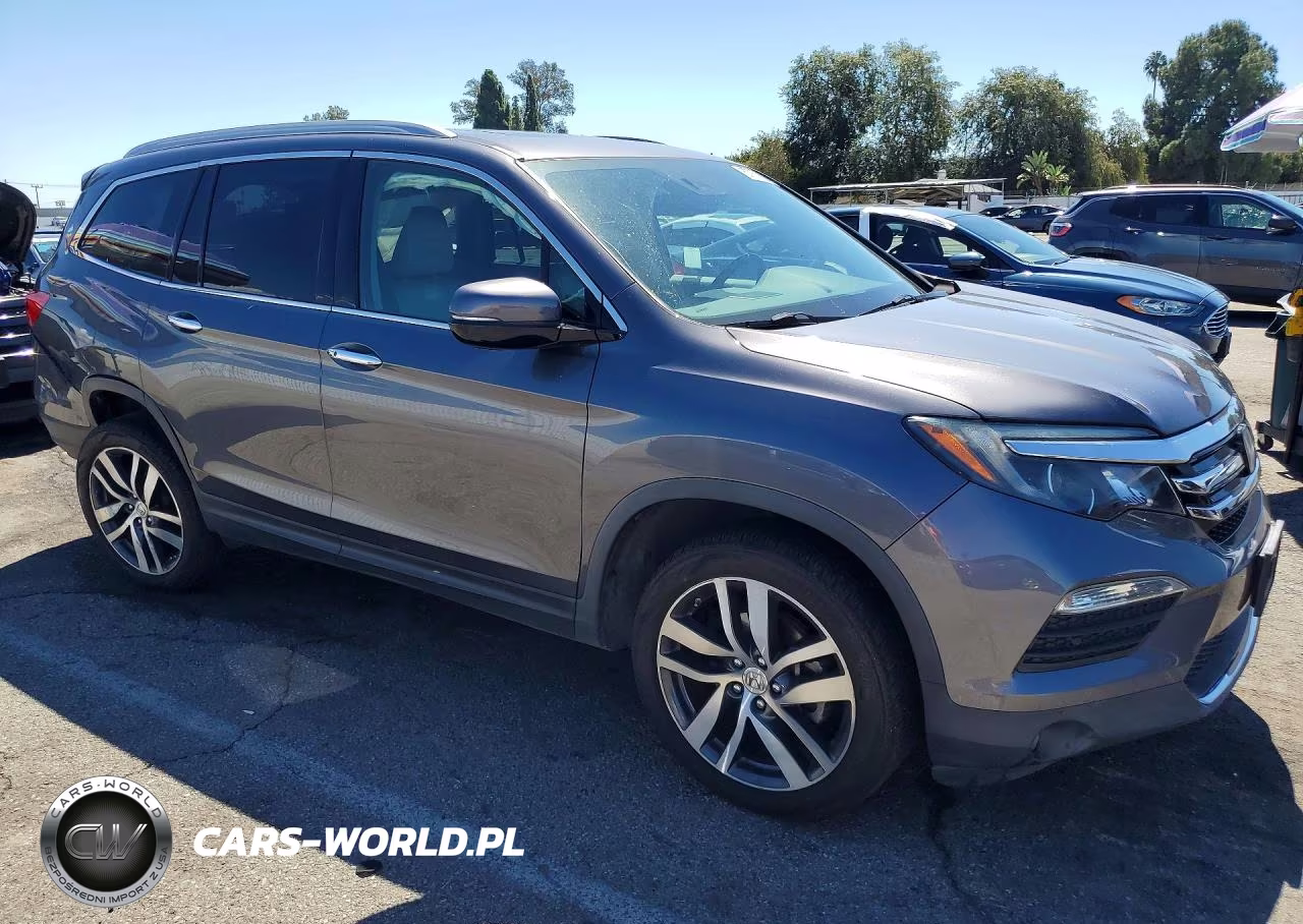 2017 Honda Pilot Elite VIN:5FNYF6H08HB038243 - 4