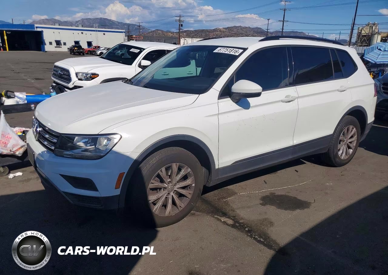 2018 Volkswagen Tiguan S VIN:3VV1B7AX9JM108006 - 1