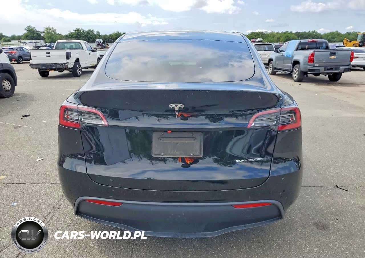 2023 Tesla Model Y VIN:7SAYGAEE8PF861529 - 6