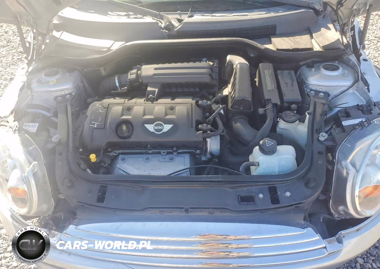2010 Mini Cooper VIN:WMWMF3C57ATZ65802 - 11