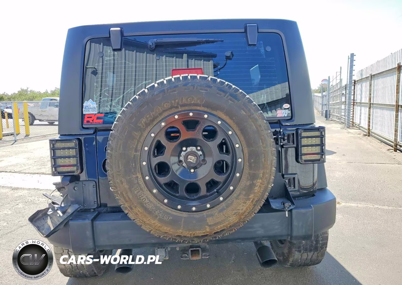 2013 Jeep Wrangler Unlimited Sport VIN:1C4BJWDG5DL702819 - 6