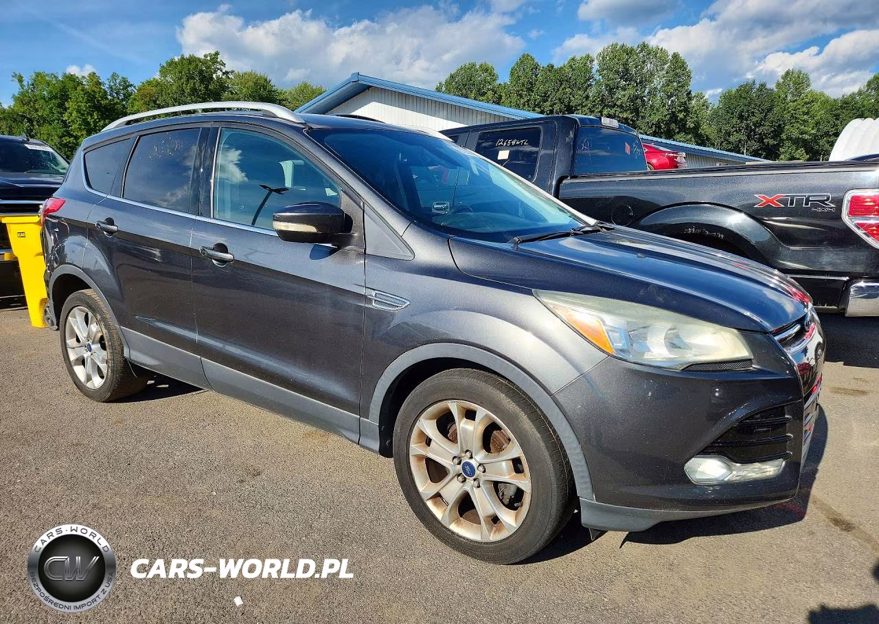 2015 Ford Escape Titanium VIN:1FMCU0JX4FUA14817 - 4