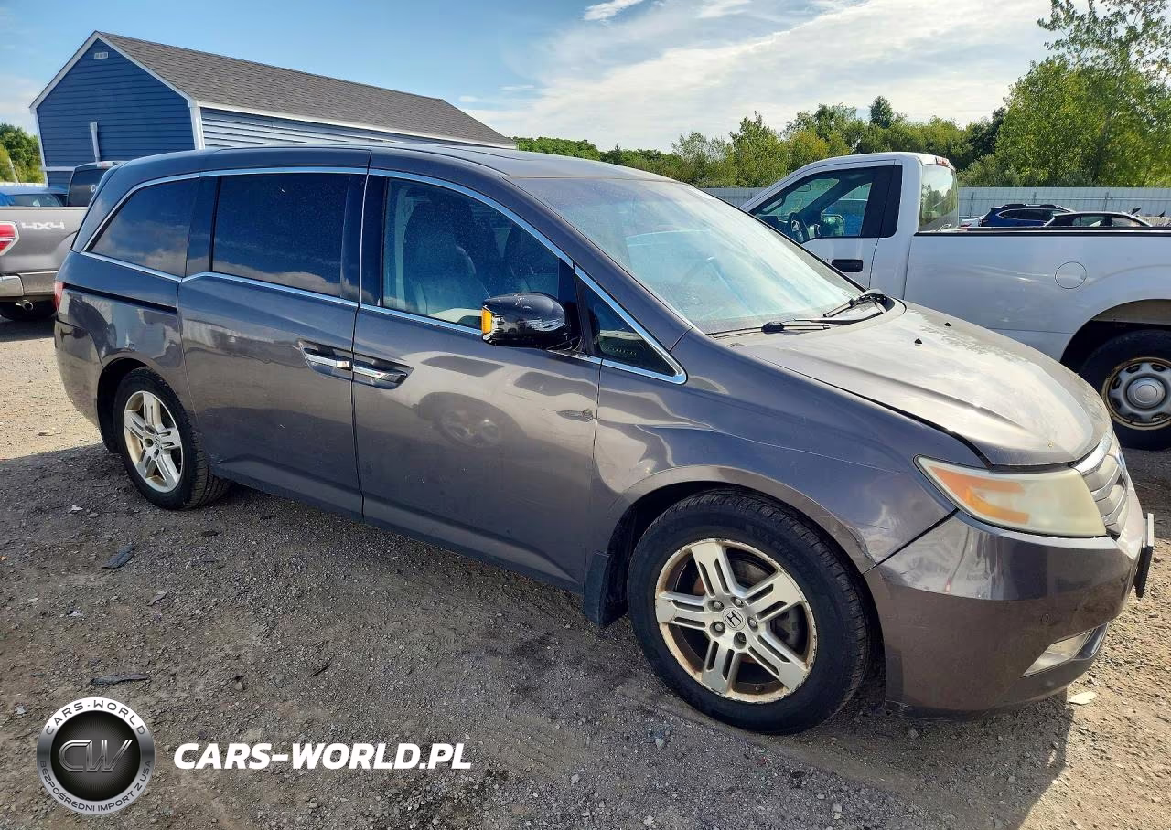 2012 Honda Odyssey Touring VIN:5FNRL5H93CB112134 - 4