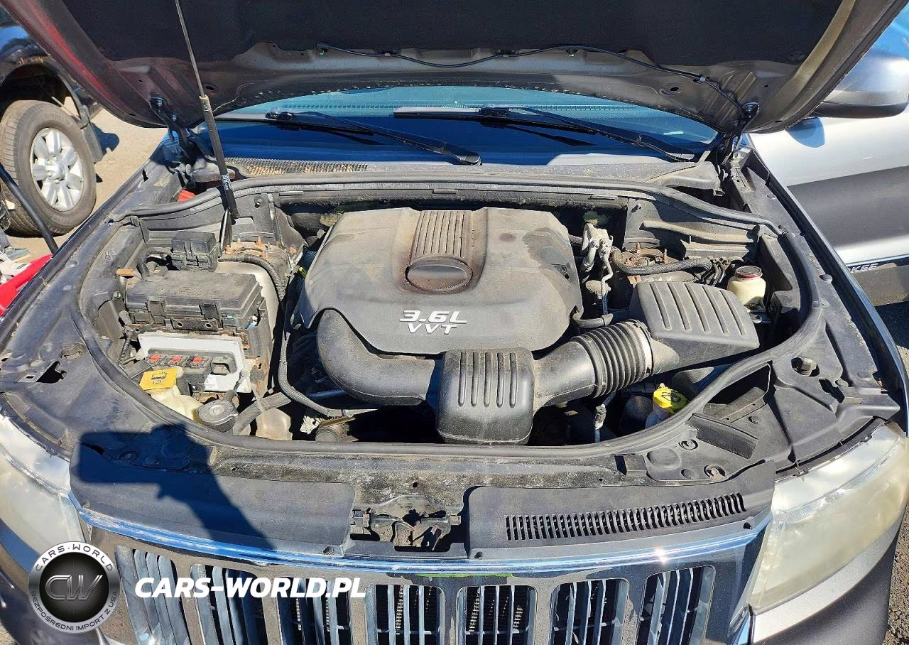 2012 Jeep Grand Cherokee Laredo VIN:1C4RJFAG4CC115691 - 12